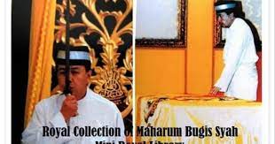 Sultan sharafuddin idris shah holding the keris beruk berayun in his portrait. Keris Panjang Beruk Berayun Rayuik