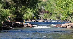 The clear creek trail runs more than 20 miles from metro denver, through wheat ridge, to golden along a picturesque creek with views of the north and south table mountains. Clear Creek Trail In Downtown Golden