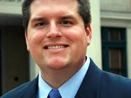 Hamman supporter bashes opponent's father