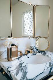 The item is made from polypropylene with the synthetic rubber seal. Waterworks Brass Vanity Mirror Transitional Bathroom