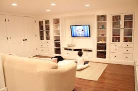 Wall Of Built Ins Out Of Ikea Hemnes Cabinets Ikea Built In Basement Decor Basement Design
