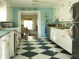 And as always, black, white, and wood work perfectly in the kitchen. White Kitchen With Black Tile Floor Novocom Top