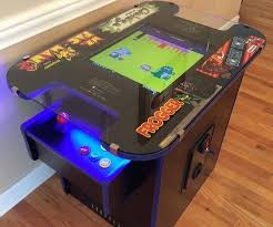 We all love the idea of owning an arcade machine, but size and space is always a limiting factor. Retro Arcade Gaming Machine Cocktail Table Version Off Site Bouncy Castle Inflatable Hire In Leeds Wakefield Huddersfield Halifax York Sheffield