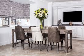 It has a small dining table for four that sits on hardwood flooring. Dining Room Furniture Inspiration Peppermill Interiors