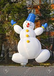 Maybe you would like to learn more about one of these? Cheerful Inflatable Snowman Christmas Decoration On The Street Stock Photo Picture And Royalty Free Image Image 93737022
