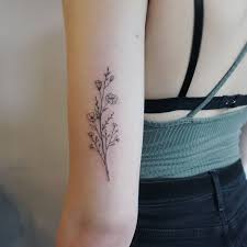 Petite Fleur Sauvage Fleur Sauvage Tatouages Tatouages Wildflower Tatouage Botanique Tattoo In 2020 Floral Arm Tattoo Tricep Tattoos Tattoos