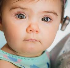 Early intervention programs to assist children with hearing loss develop  spoken language.