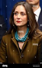 Oklahoma First Lady Sarah Stitt listens during a news conference to  announce that Oklahoma will release more than 400 inmates after the board  approved what they say is the largest single-day mass