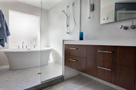A mix of ann sacks surfaces, including a pebble wall covering, brings a warm feel to a guest bath of an aspen, colorado, home which was renovated by stonefox architects. Modern Bathroom Renovations Whaciendobuenasmigas