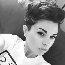 A tentacle swabs the inside of this short haired black and blue haired tomboy's cheek for her dna to put on a usa dna database of violent female video game characters!!! Tomboy Hairstyles