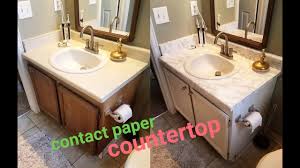 Host amy matthews shows how to spruce up a vanity by installing a bathroom countertop and undermount sink. Diy Marble Contact Paper Over Formica Bathroom Countertop Youtube