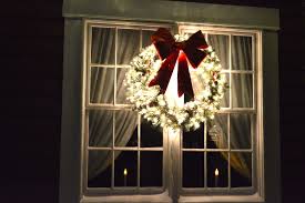 Large Wreath With White Lights And Red Bow Christmas Light Displays Outdoor Christmas Light Displays Outdoor Christmas Lights