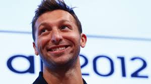 Ian Thorpe denies gay rumors, says he'll keep swimming