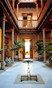 Harmonious Spanish Style House Plans With Interior Courtyard Slope In 2020 Indian Home Design Kerala House Design Traditional House Plans