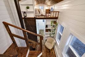 Wedge Shaped Bookshelves Add Privacy To Lofts And Much Needed Book Space Tiny House Company Tiny House Listings Tiny Apartments