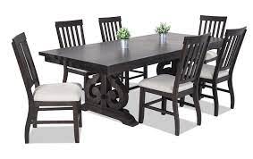 Most are made of wood and may be painted white, finished with a light or dark brown stain, or left natural. Sanctuary 7 Piece Dining Set With Slat Chairs Bob S Discount Furniture