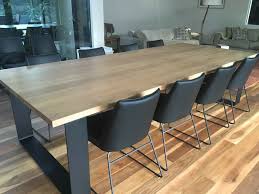 Blue hydrangeas are a flawless complement to the rich warm tones of natural cherry wood. Black Frame Dinner Tables Furniture Timber Dining Table Dining Room Table