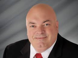 Hamman supporter slams opponent's father