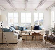 Like vintage trunks that have been repurposed to serve as occasional tables, this piece boasts ample storage and style. Kaplan Reclaimed Wood Lift Top Coffee Table Pottery Barn