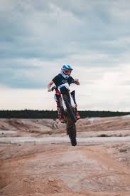 Find the best dirt bike wallpapers on wallpapertag. Man Riding Blue And White Motocross Dirt Bike Photo Free Vehicle Image On Unsplash