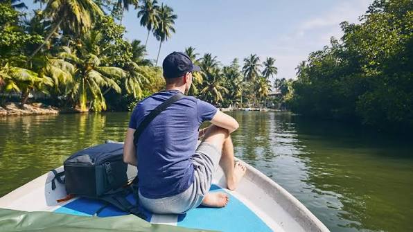 Negombo Lagoon Ettukala catamarans fishing nets sunset mangroves birds west coast Sri Lanka