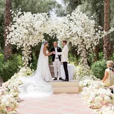 From elegant string lighting to one of the easiest ways to decorate your ceremony is by placing flower petals down the aisle. 50 Beautiful Ways To Decorate Your Wedding Aisle