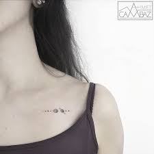 30 Simple Yet Striking Tattoos By Former Turkish Cartoonist That You Ll Want On Your Skin Solar System Tattoo Tattoos Subtle Tattoos