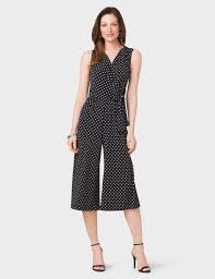 Polka Dot Faux Wrap Jumpsuit Original Price 54 00 Available At Dressbarn Jumpsuit Wrap Jumpsuit Trending Outfits