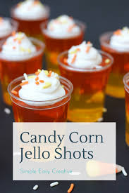 Candy Corn Jello Shots These Fun Treats Can Be Made With Or Without Alcohol And Are Always The Hit Of Th Candy Corn Jello Shots Jello Shots Jello Shot Recipes
