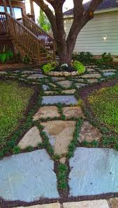 Back Yard Landscape Flagstone Walkway Edged With Dwarf Mondo Grass Dwarf Mondo Grass Mondo Grass Backyard Landscaping Designs