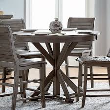 5 piece modest counter height round kitchen area table with four solid wood bar stool. Willow Round Counter Height Table Distressed Gray By Progressive Furniture Furniturepick