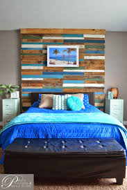 The reclaimed wood accent wall in modern and contemporary bedrooms is all about adding textural contrast without actually going overboard with color. Remodelaholic Colorful And Rustic Plank Headboard Wall