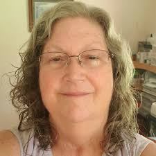 How do I get rid of rusty steam and water droplets from my iron?