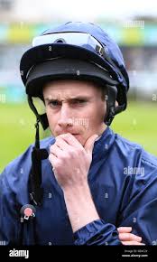 Races jockey whip hi-res stock photography and images