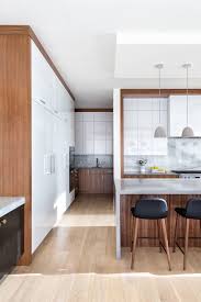 Modern Kitchen Glossy White And Walnut Elbow Park Modern Nyla Free Designs Calgary Interior Desig Modern Kitchen Modern Kitchen Design Open Concept Kitchen