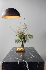 And unlike many pedestal tables out there, it can seat up to six with plenty of legroom. 4 Creative Ways To Use Formica To Update Your Home Black Marble Coffee Table Marble Table Design Dining Table Marble