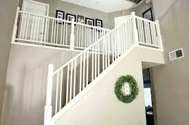 Be careful not to punch all the way through the rail. How To Build And Install A Custom Diy Stair Railing Thediyplan