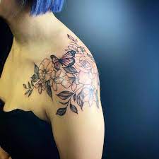Stipple Shading Whipshading Floral Shoulder Tattoo With Hints On Pink Including Butterfly Tattoo In 2021 Floral Tattoo Shoulder Butterfly Tattoo On Shoulder Tattoos