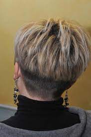 The straight, short bangs make it a 'do distinct from a pixie cut. Short Nape Hair Styles Short Hair Styles Wedge Haircut