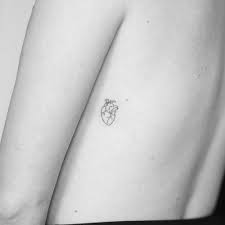 Heart rib tattoos heart in cage tattoo on right thigh. Fine Line Anatomical Heart Tattoo On The Left Side