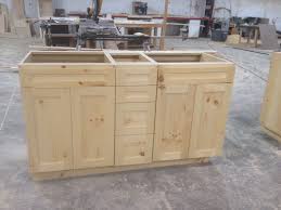 Here the only knotty pine is on the face of the vanity, otherwise its all about the greys. Knotty Pine Vanities Frameless With Natural Finish Turned Out Beautiful Pine Kitchen Custom Cabinets Custom Woodworking