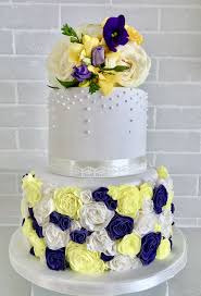 Purple And Yellow Rose Ruffle Wedding Cake By Serendipity Cake Company Chocolate Wedding Cake Yellow Wedding Cake Wedding Cake Roses