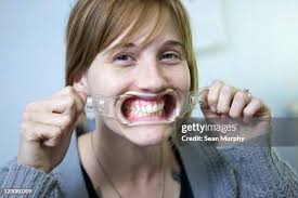 126 Pulling Cheek Stock Photos, High-Res Pictures, and Images