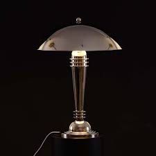 An art deco table lamp, bakelite and anodized metal with milk glass shade, circa 1930, 60 cm high. ÙŠÙ…ÙƒÙ† Ø§Ù„ÙˆØµÙˆÙ„ Ø³Ø§Ø­Ø± Ø³Ø§Ù†Øª Art Deco Reproduction Floor Lamps Myfirstdirectorship Com