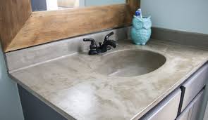Diy feather finish concrete countertops. How S It Holding Up Diy Concrete Vanity Update Designertrapped Com