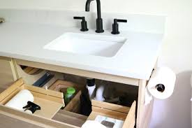 Floating vanities allow for a continuous floor, making a bathroom feel larger. Ikea Vanity Hack Hannah Tyler Ikea Vanity Ikea Vanity Hack Ikea Vanity Ideas