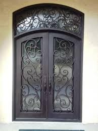 Tuscany With Attached Transom In 2020 Iron Entry Doors Wrought Iron Doors Wrought Iron Front Door