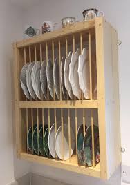 Drill holes sized for the magnets and drop in a dab of super glue. Insert Plate Rack The Plate Rack Co Ltd