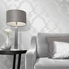 As well as offering high grade chunky glitter wallpapers, we stock both plain and patterned designs with just a touch of fine glitter for a subtle glimmering effect. Fine Decor Quartz Damask Silver Glitter Wallpaper Fd41965