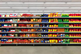 Chips And Snacks On A Shelf In A Supermarket Suitable For Presenting New Packaging Among Many Others Hitra Supermarket Shelves Supermarket Stock Images Free
